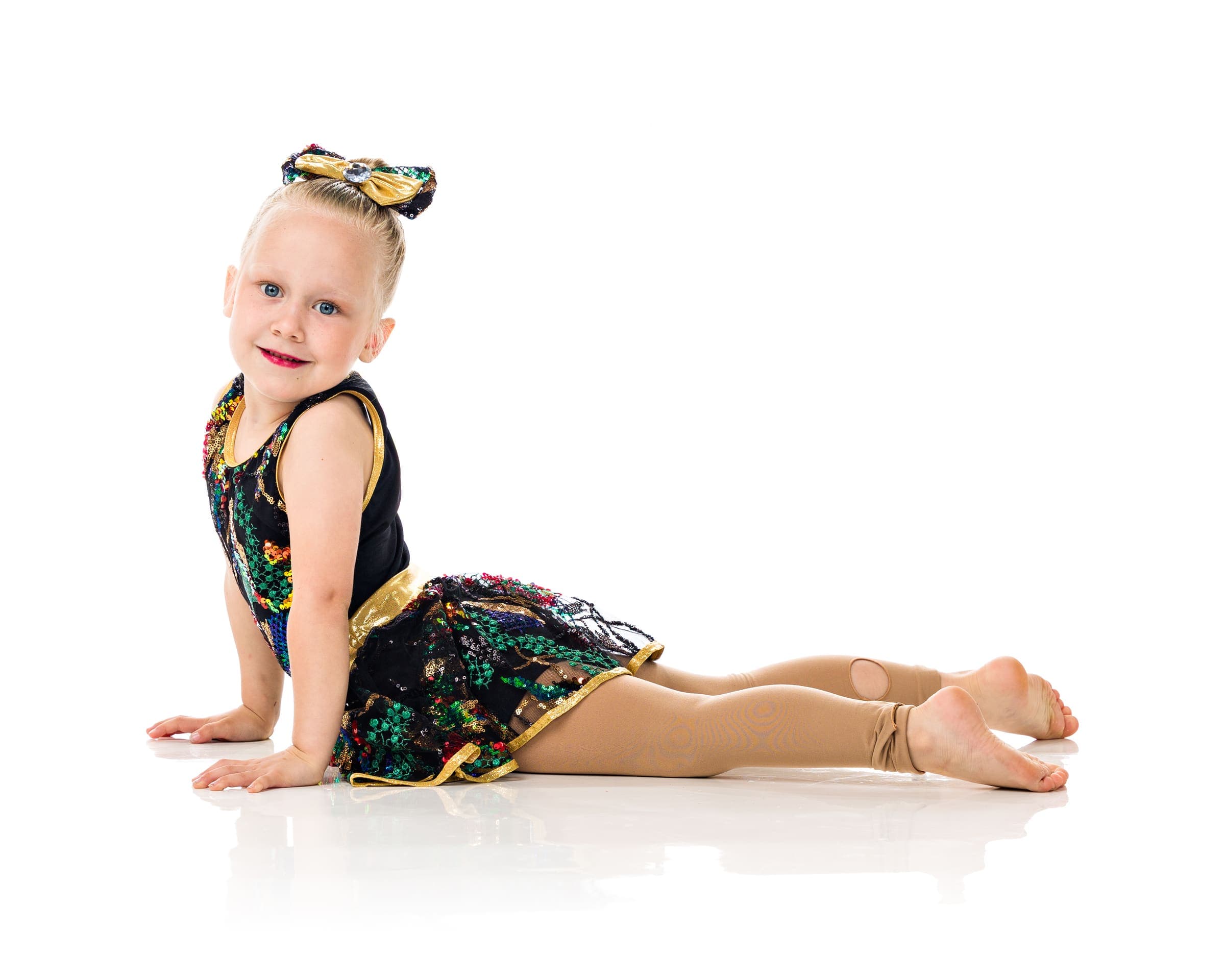 Young dancers smiling together at Cypress Elite Dance Studio