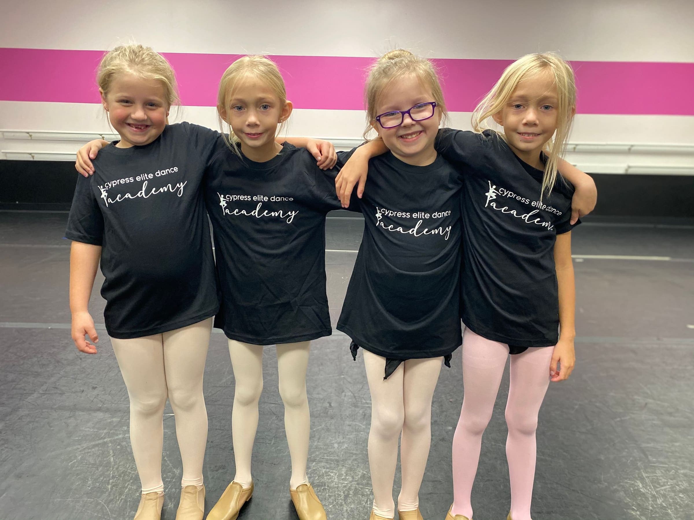 Young ballet dancers performing on stage