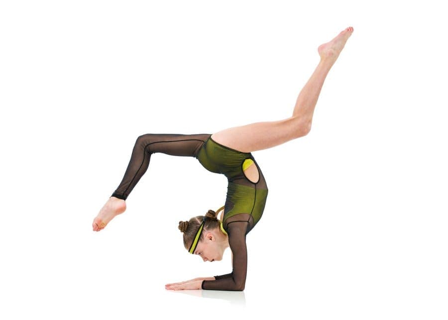 Advanced acro dancer preparing for elite technique