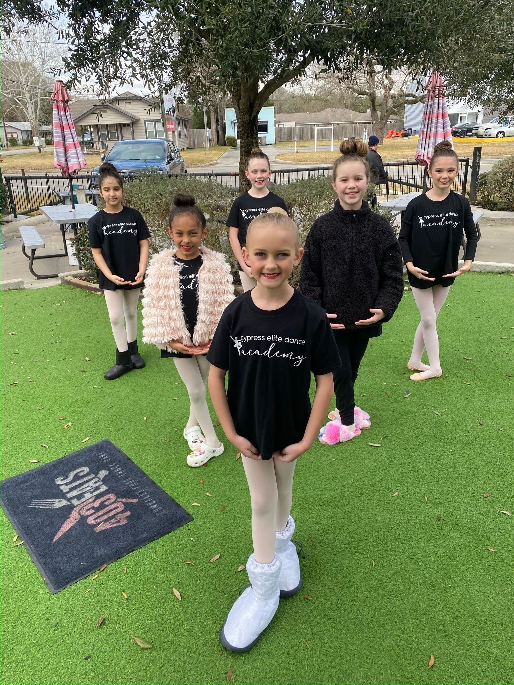 Dance group rehearsing for a community performance