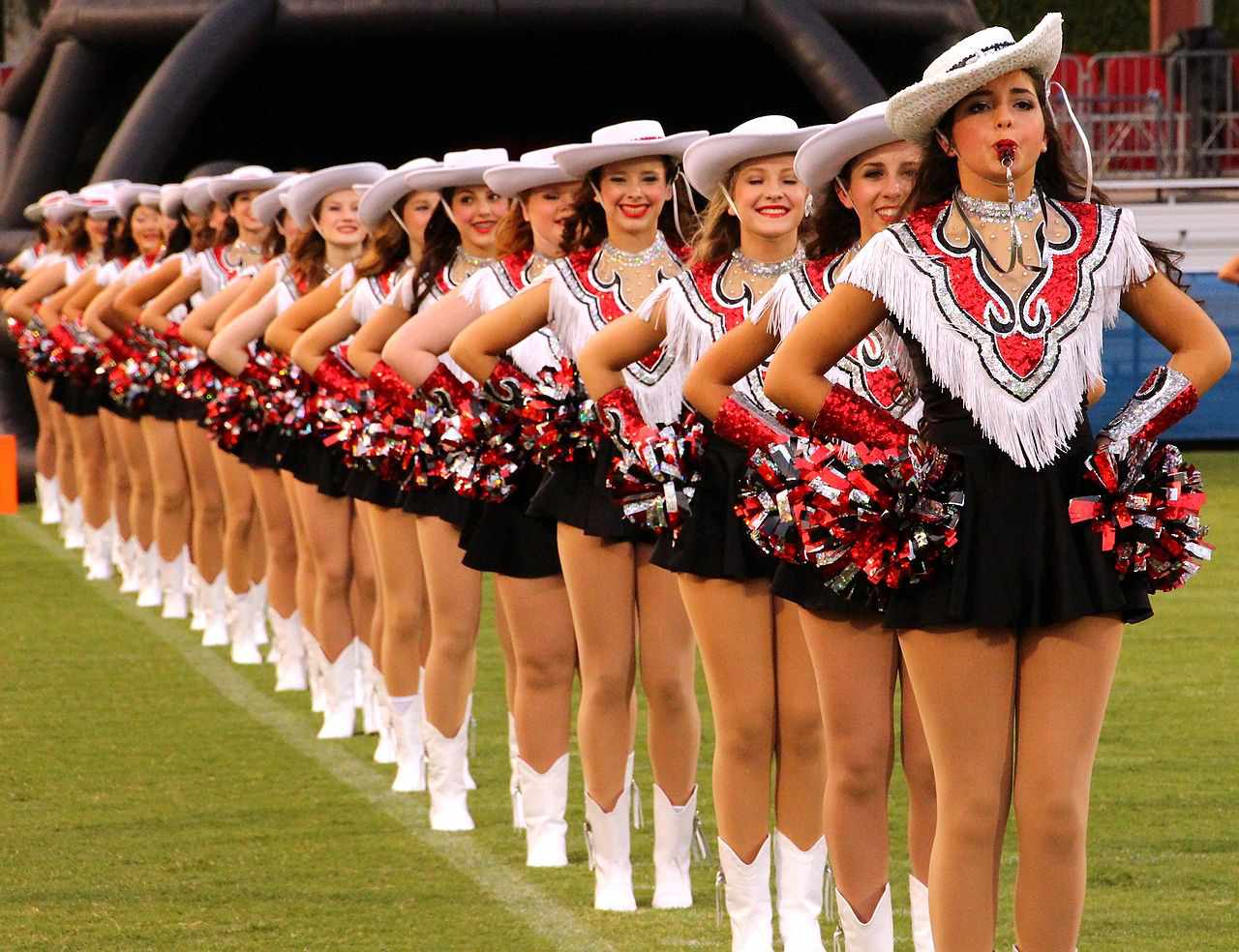 High school drill team posing together