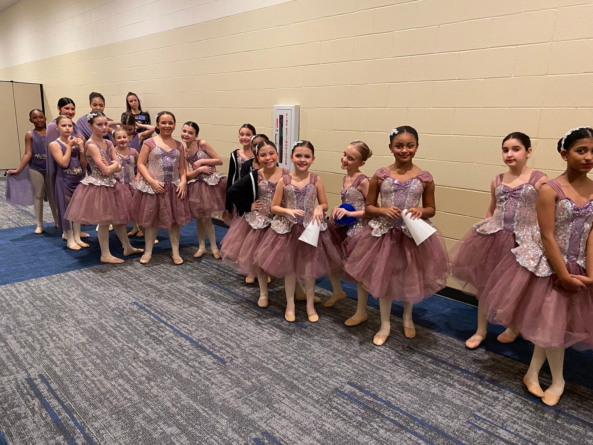 Cypress Elite dancers sharing a community moment